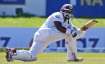 Sri Lankan batsman Charith Asalanka plays a shot during the fourth day of the second Test against Sr