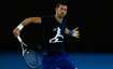 Novak Djokovic of Serbia plays a backhand during a practice session.