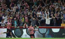 Brentford's Christian Norgaard, center, celebrates after
